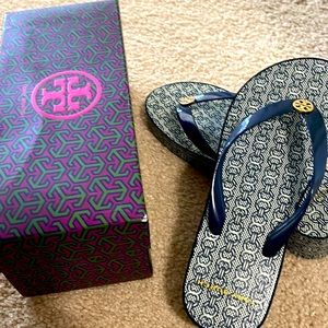 Tory Burch navy with gold symbol of Tory Burch front